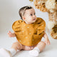 Snuggle bib - sunrise frill